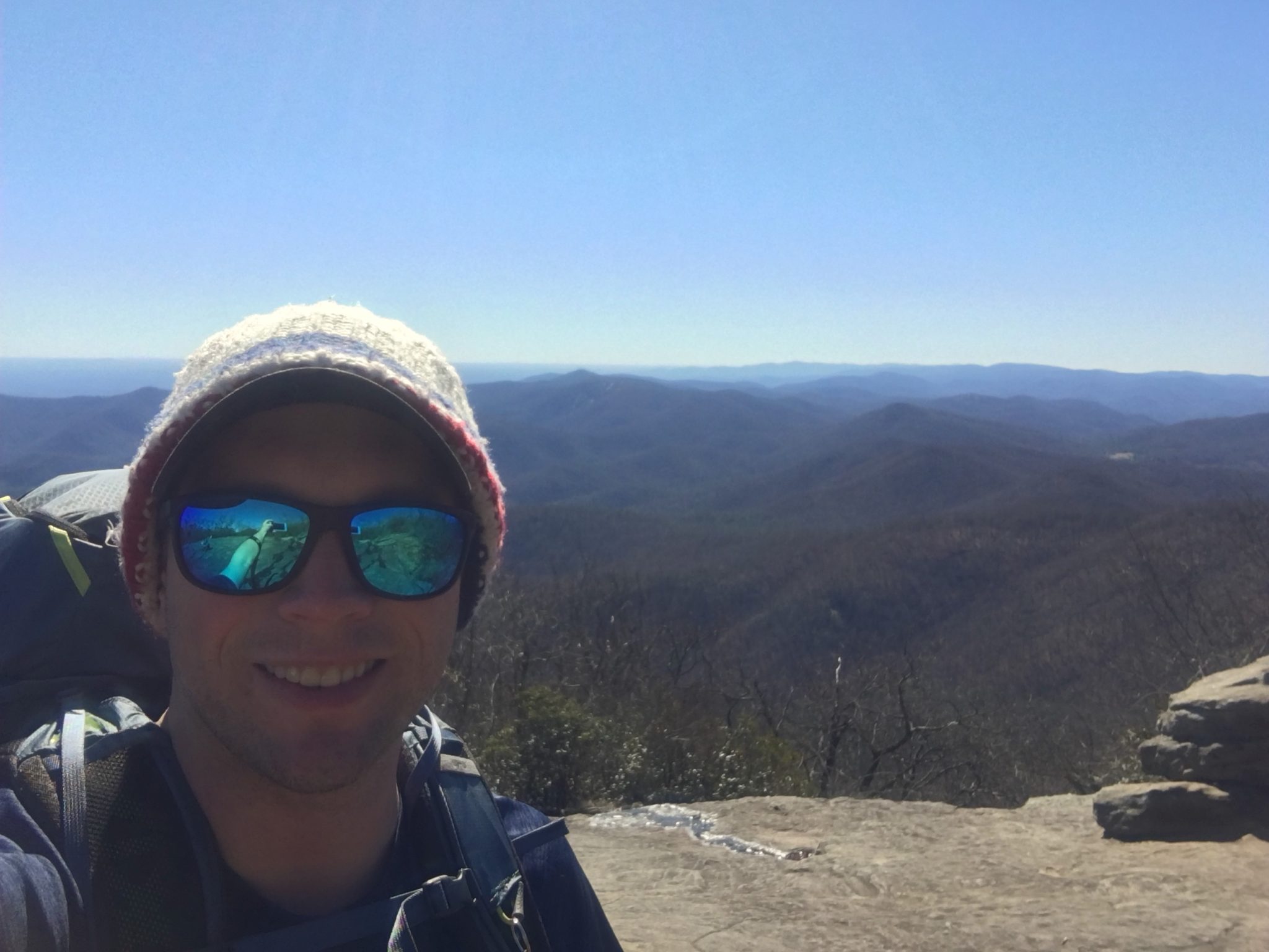 Smiling through the pain on top of Blood Mountain