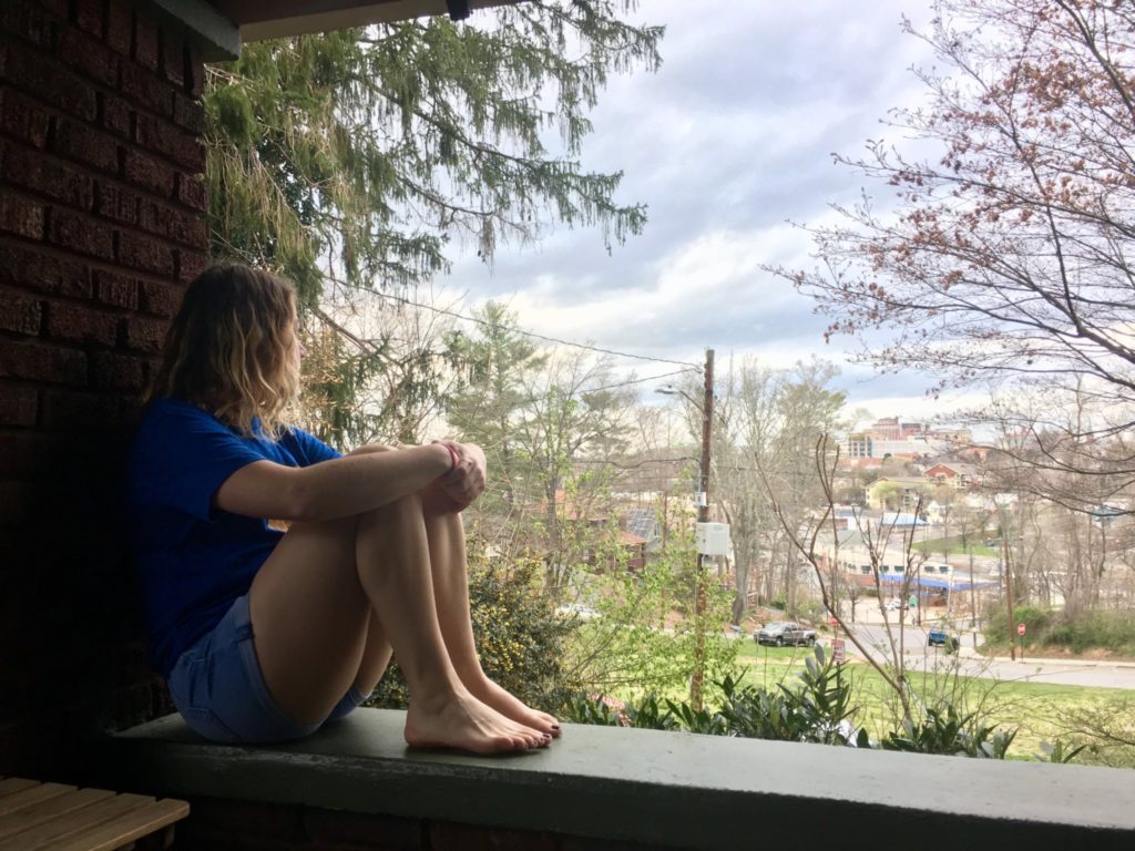 Lindsey relaxing on her porch in Asheville